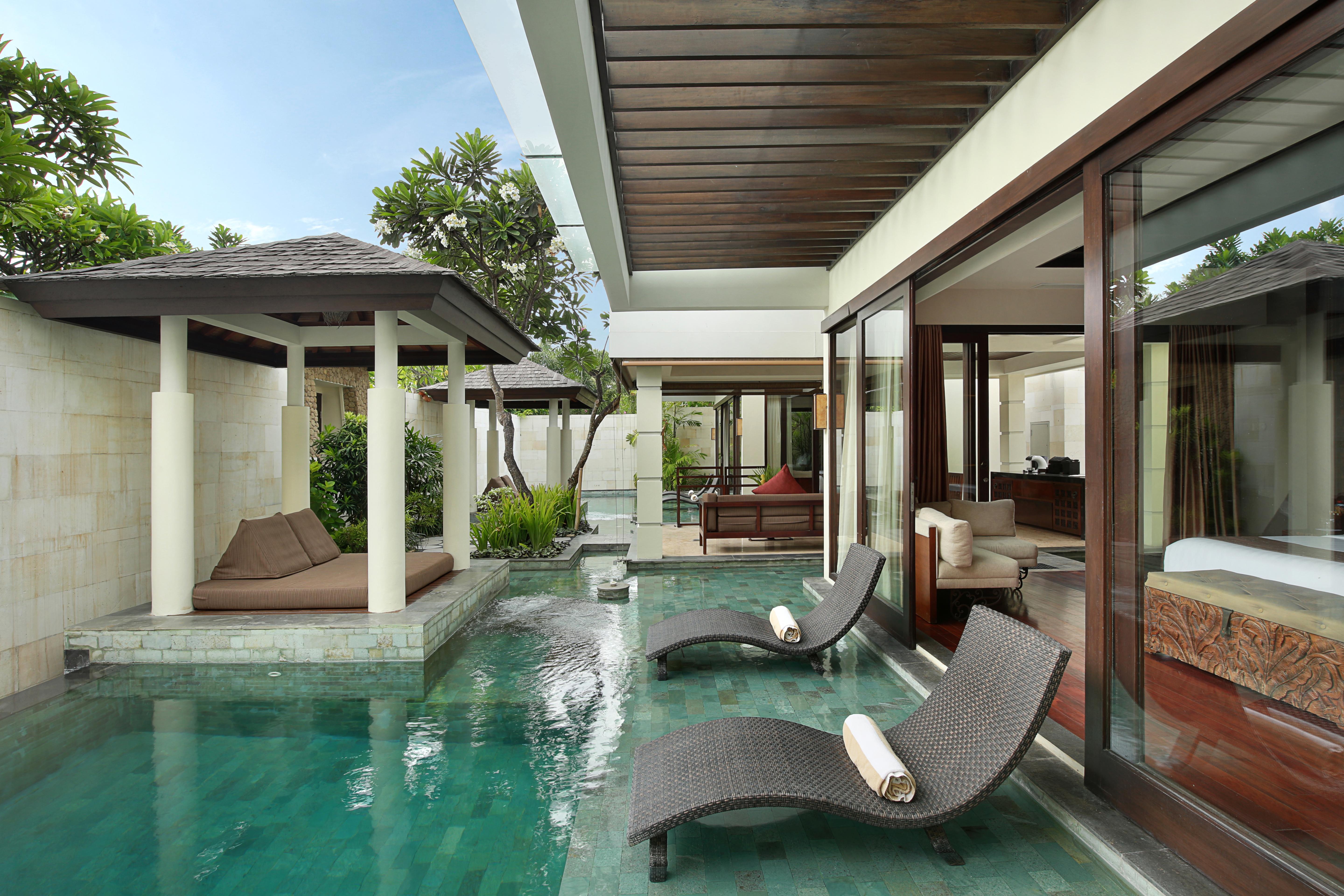 The Seminyak Beach Resort & Spa Esterno foto A pool villa at the resort