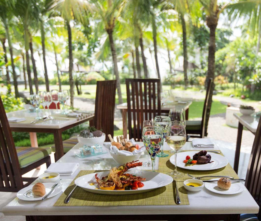 The Seminyak Beach Resort & Spa Esterno foto A table set for fine dining